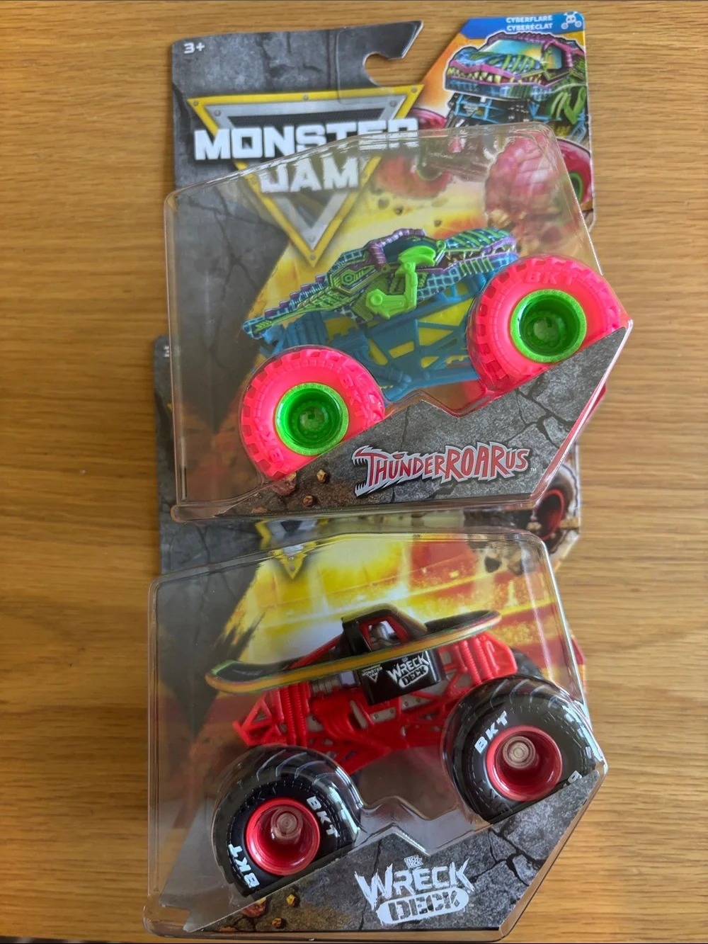 ThunderRoarus & Wrecking Crew 2-Pack Kids Toy Trucks - Pink, Green, Red, Black